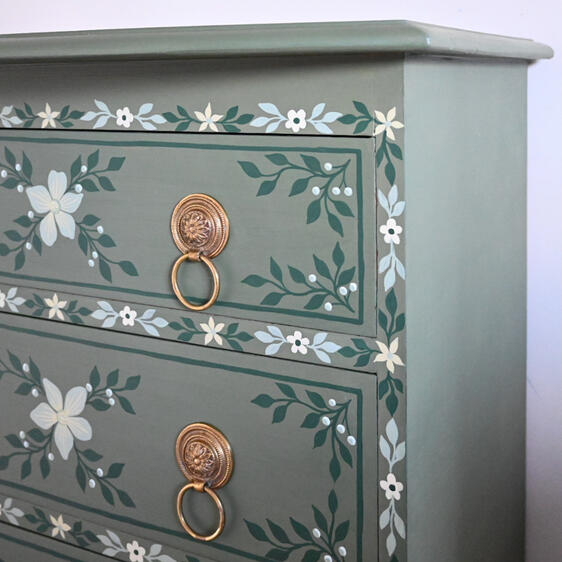 Draws in Annie sloan olive Hand-painted green floral chest of drawers with brass ring handles, vintage style wooden bedside table.